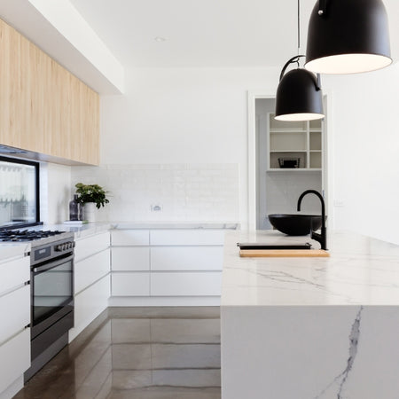 White Carrara Marble EGGER Benchtop from Forest1 available to buy from Plyco used in a residential kitchen renovation