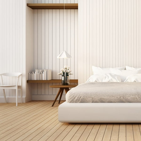 Bedroom featuring Surround by Laminex wall panels from Plyco and painted white