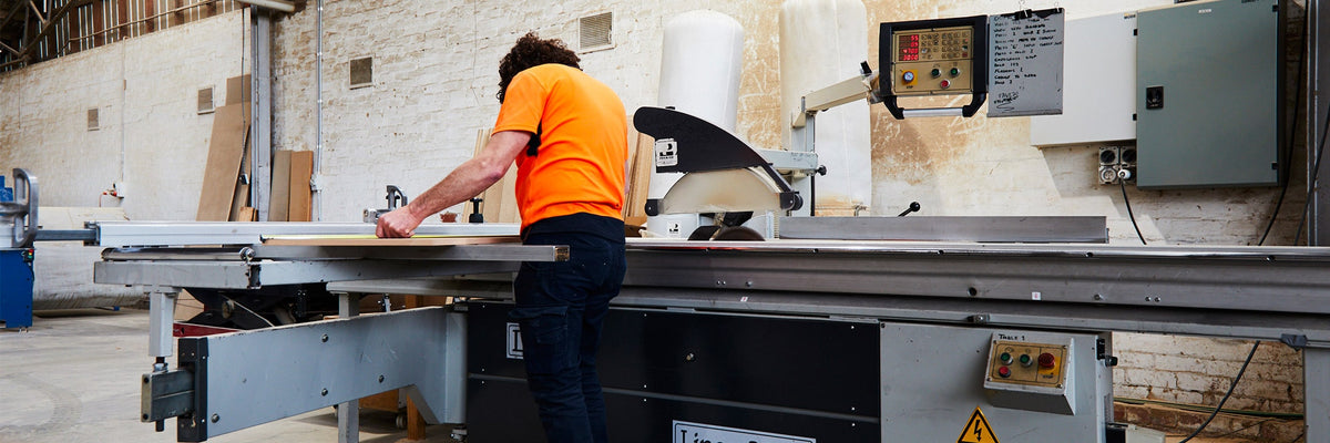 Panel saw operator cutting plywood to size in Melbourne