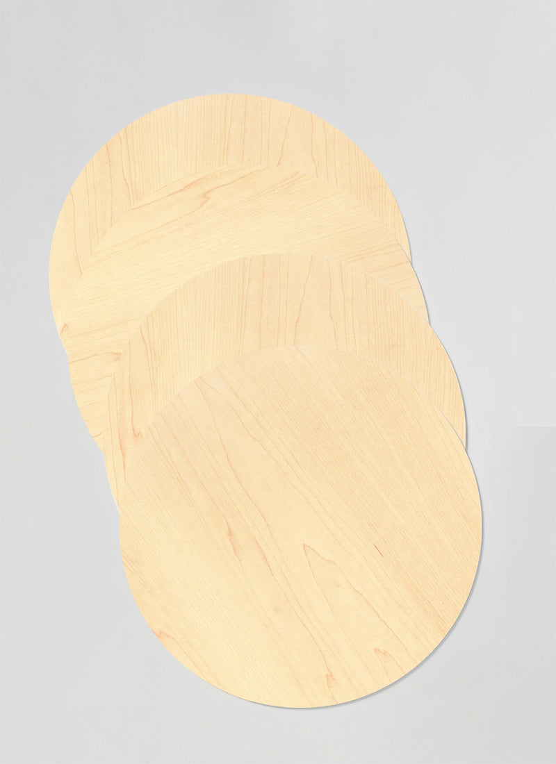 Four pack of Plyco's 3mm Canadian Rock Maple Laserply circles on a white background