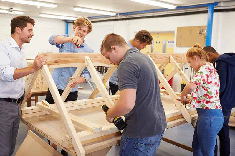 Student at an Australian High School constructs a project using Melbourne plywood supplier Plyco's Laserply panels for laser cutting and engraving