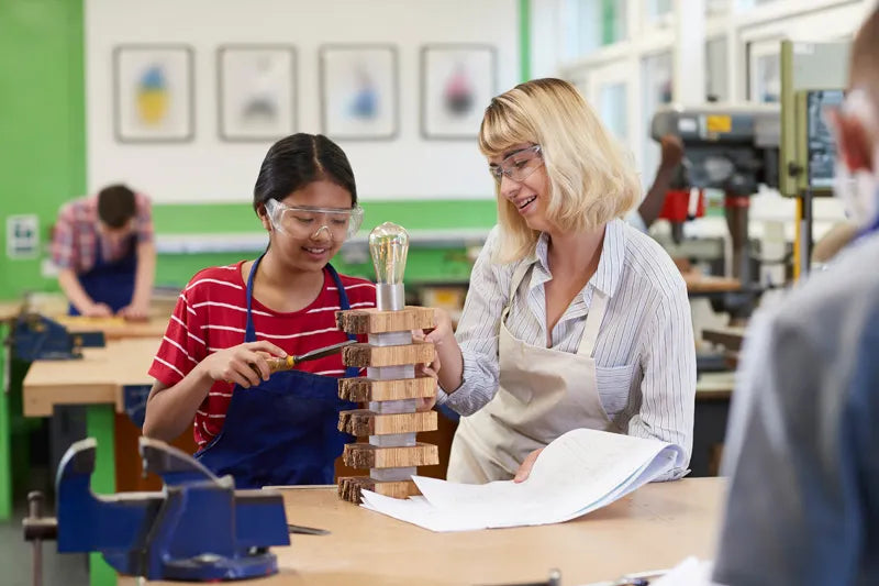 Student at an Australian High School constructs a project using Melbourne plywood supplier Plyco's Laserply panels for laser cutting and engraving