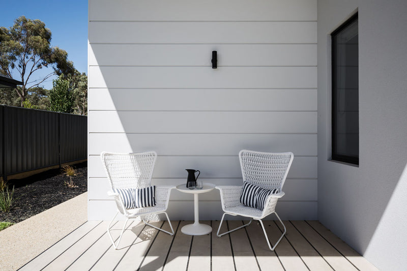 Close up of Melbourne plywood supplier Plyco's 2745 x 1220mm x 12mm Radiata Natural Texture Shadowclad from Carter Holt Harvey painted grey and used as exterior cladding in a Mornington Peninsula residential building project