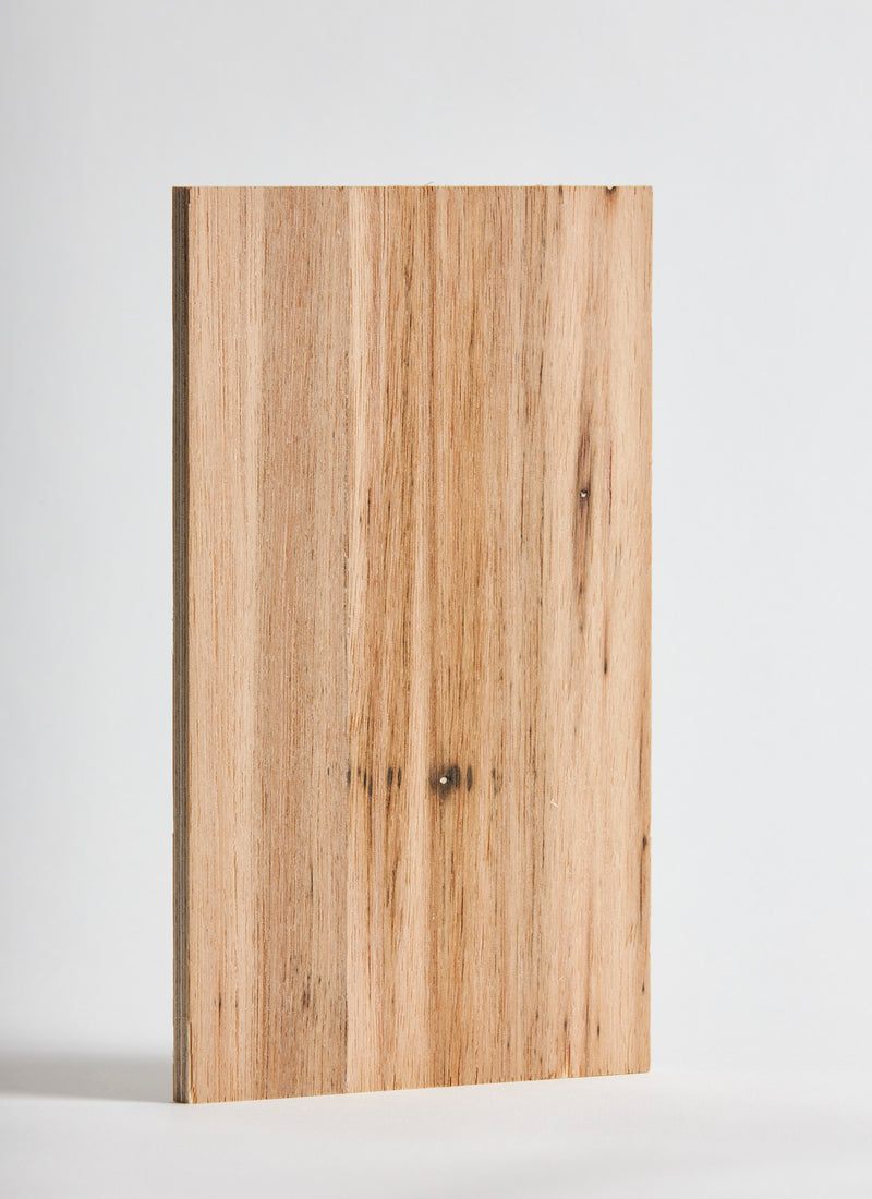Plyco's NFG Blackbutt timber veneer on Birch 12mm Quadro plywood panel on a white background