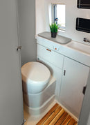 Bathroom in a RV / Caravan featuring 3mm Ashen Vanply for interior caravan wall panels and cabinets from Melbourne plywood supplier Plyco without a white background