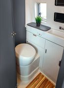 Bathroom in a RV / Caravan featuring 3mm Charcoal Vanply for interior caravan wall panels and cabinets from Melbourne plywood supplier Plyco without a white background