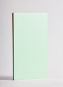 Plyco's Mint Decor Laminate pressed onto a Birch Plywood core (Decoply) on a white background