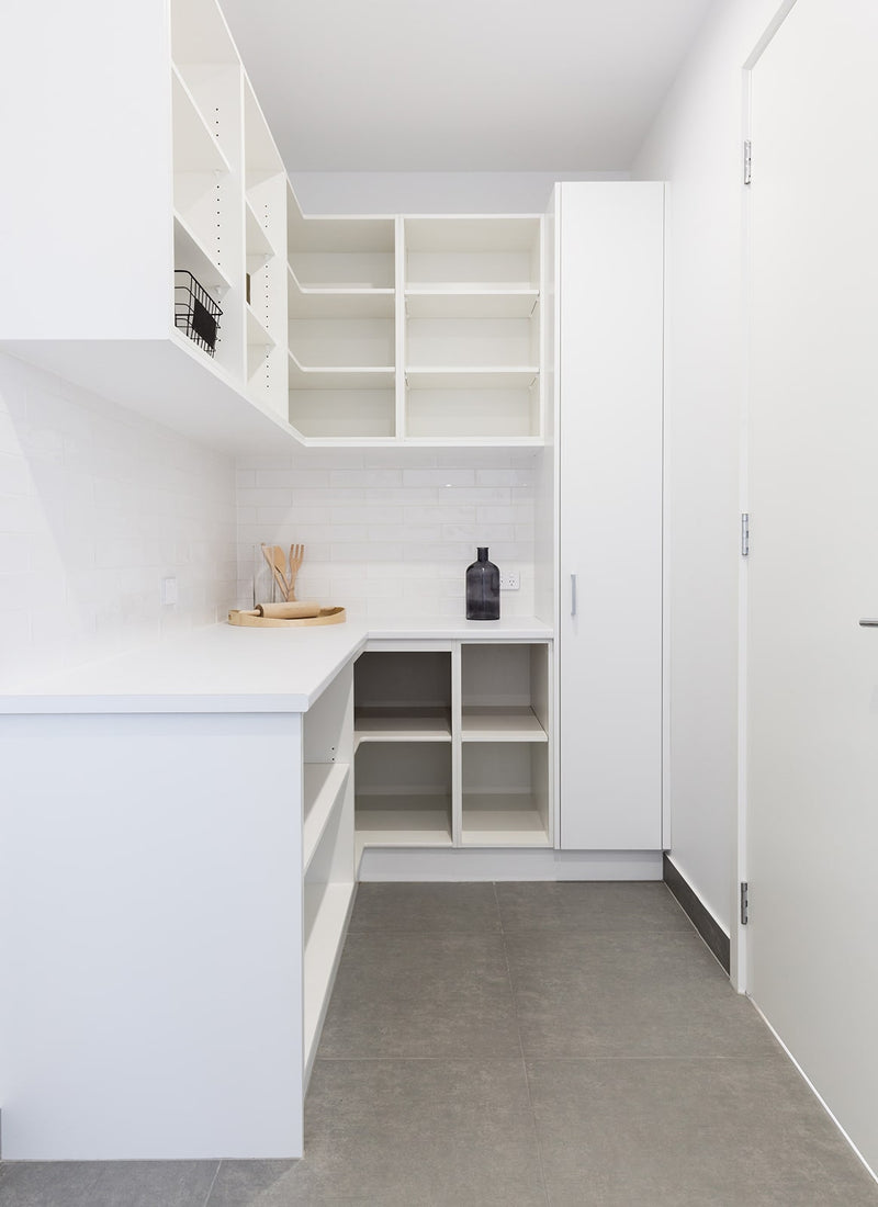 Melbourne plywood supplier Plyco's 16mm Drilled and Undrilled Particleboard Backing used as cabinetry in a kitchen joinery project with a white background